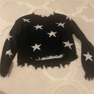 black and white star sweater from a boutique size girls xl and woman’s xs